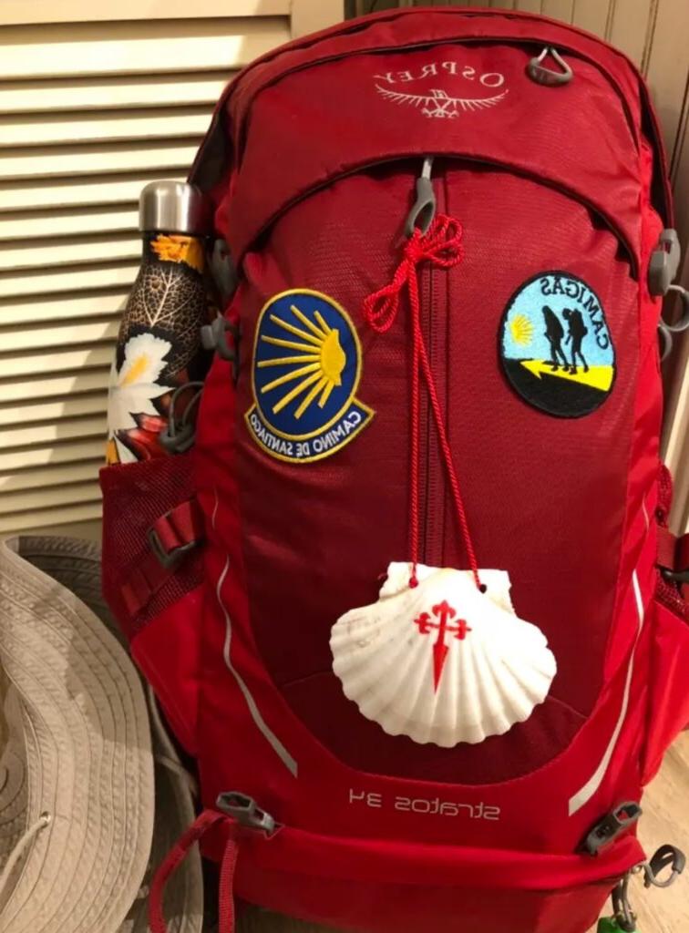 photo of backpack with pilgrim insignia